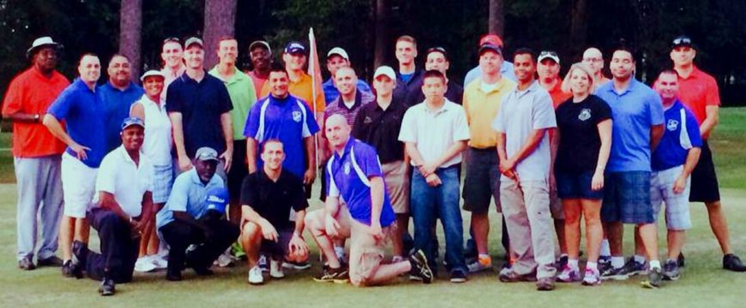 Members of the Company Grade Officer Council and the Top 3 pose for a photo Sep. 26 after a golf scramble tournament at the Columbus Air Force Base Whispering Pines golf course. The CGOC and Top 3 came together in a joint effort to not only raise wing morale and to build camaraderie, but also to generate awareness of golf course events. (Courtesy Photo)