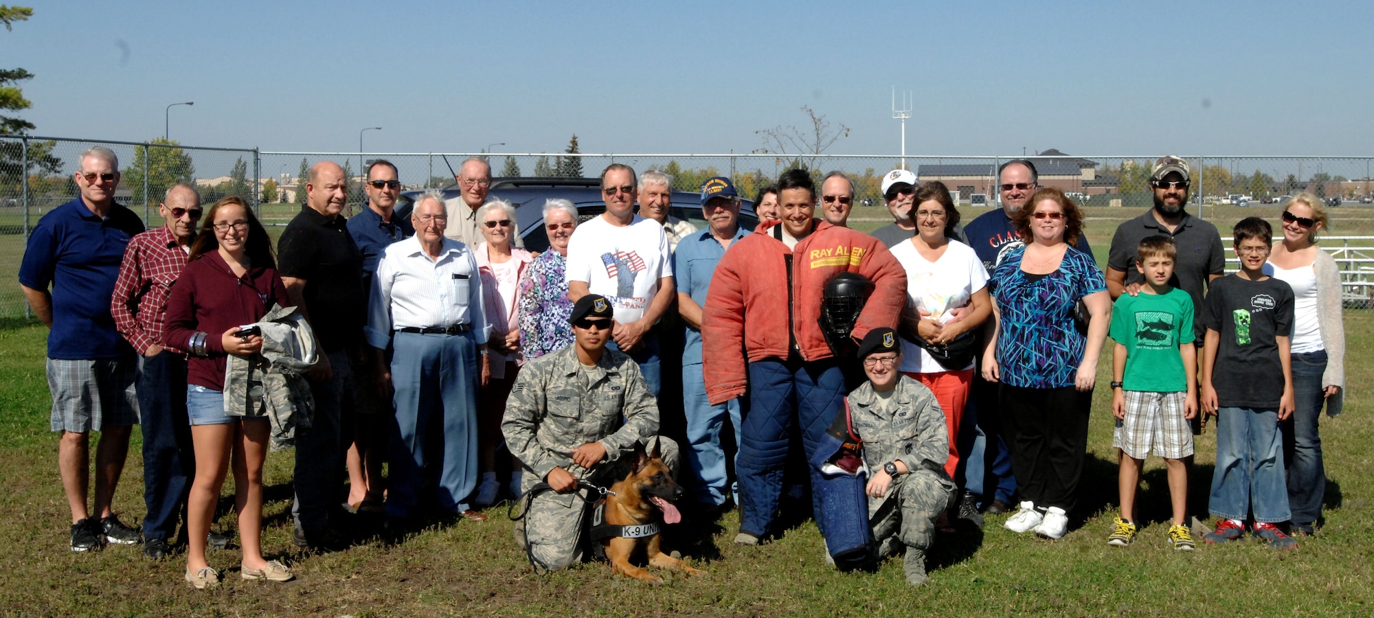Military retirees and their families toured the 319th Security Forces Squadron Military Working Dogs section Sept. 27, 2014 on Grand Forks Air Force Base, N.D. The K-9 section treated retirees and guests to a live MWD demonstration. (U.S. Air Force photo/Staff Sgt. Susan L. Davis)