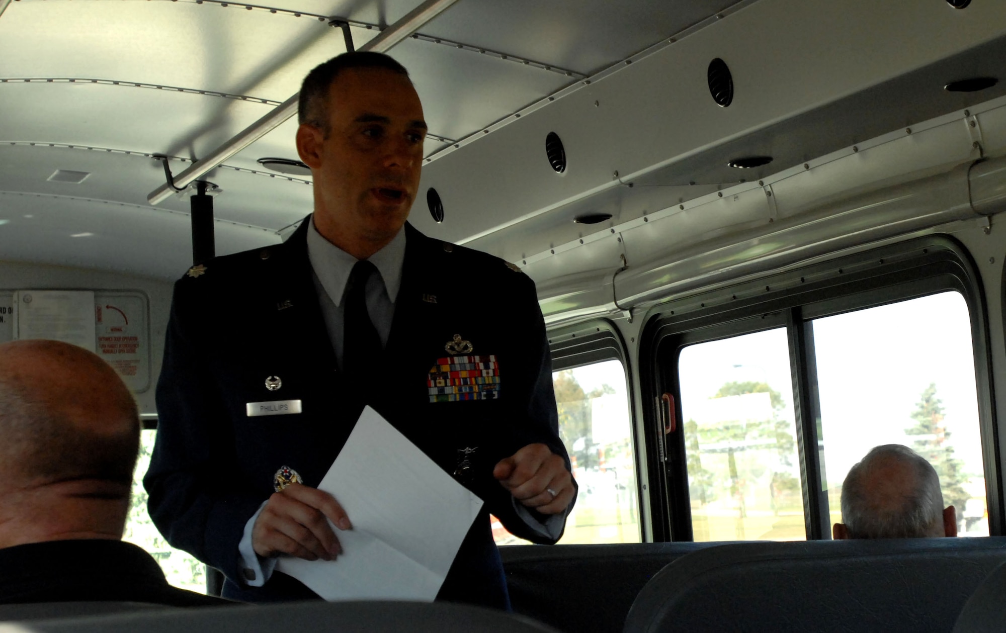 Lt. Col. Edward Phillips, 319th Civil Engineer Squadron commander, gives a windshield tour of Grand Forks Air Force Base, N.D., to military retirees Sept. 27, 2014. More than 60 military retirees visited the base to take part in Retiree Appreciation Day activities. (U.S. Air Force photo/Staff Sgt. Susan L. Davis)