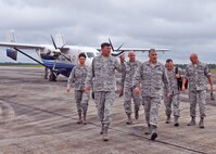 Col. James Phillips, 919th Special Operations Wing commander (foreground
right) leads a tour of Duke Field, Fla., for Lt. Gen. Brad Heithold,
commander of Air Force Special Operations Command, Sept. 29, 2014.  Behind
them are (from left):  Lt. Col. Kelly Gwin, 919th Special Operations Mission
Support Group deputy commander; Col. David Tabor, Air Force Special
Operations Air Warfare Center commander; and Chief Master Sgts. Matthew
Caruso, AFSOC command chief; and Tom Mason, 919th SOW command chief. During
Heithold's first tour of Duke as AFSOC's new top officer, he and his fellow
command leaders received an overview of ongoing and future 919th SOW
missions.  (U.S. Air Force photo/Dan Neely)
