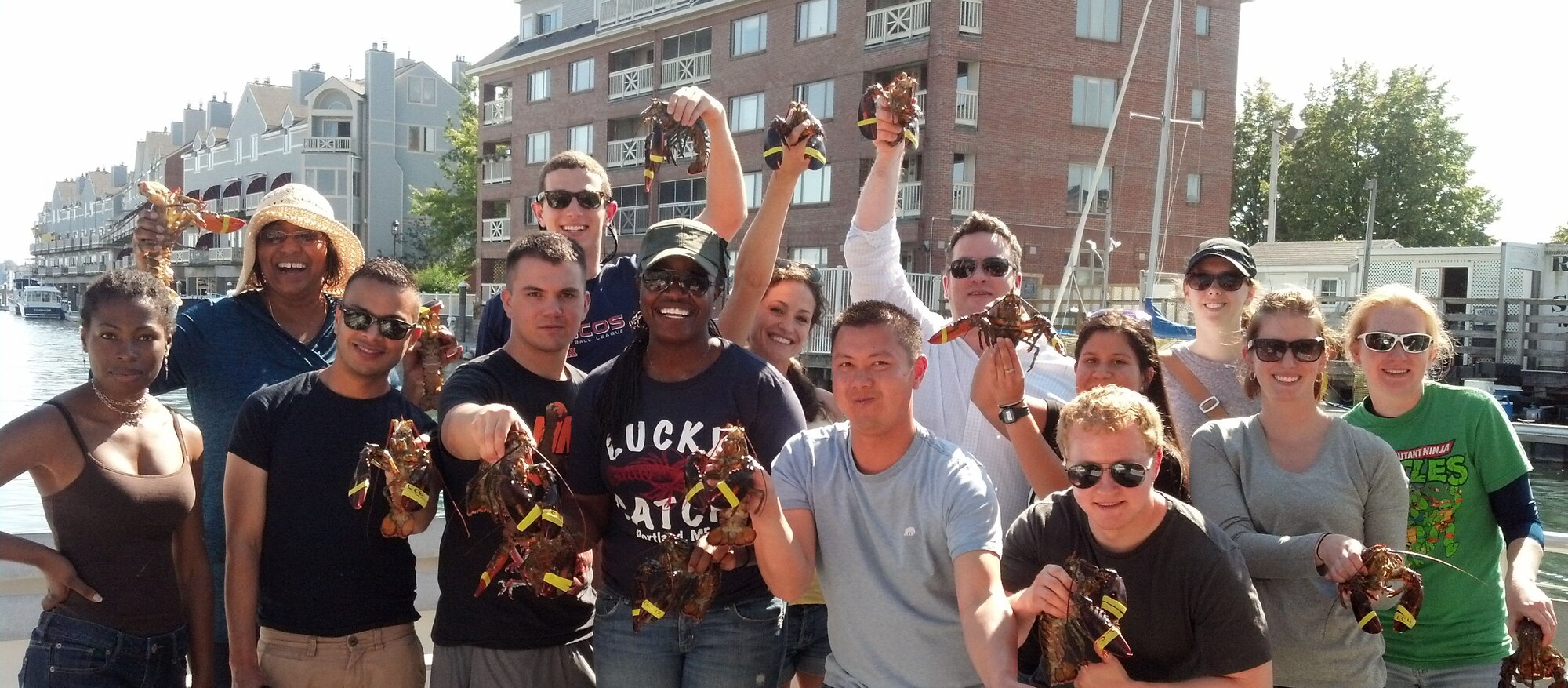 A group of officer, enlisted and civilian Airmen from Hanscom Air Force Base, Mass., participated in a Junior Force Council lobstering trip to Portland, Maine, Sept. 27. The group took a hands-on approach during the boat tour where members baited traps, hauled in live lobsters and received a history lessong on the local area's fishing industry. The Hanscom JFC hosts a wide variety of events ranging from social gatherings, profesional develoment sessions and volunteer activities. (Courtesy photo)