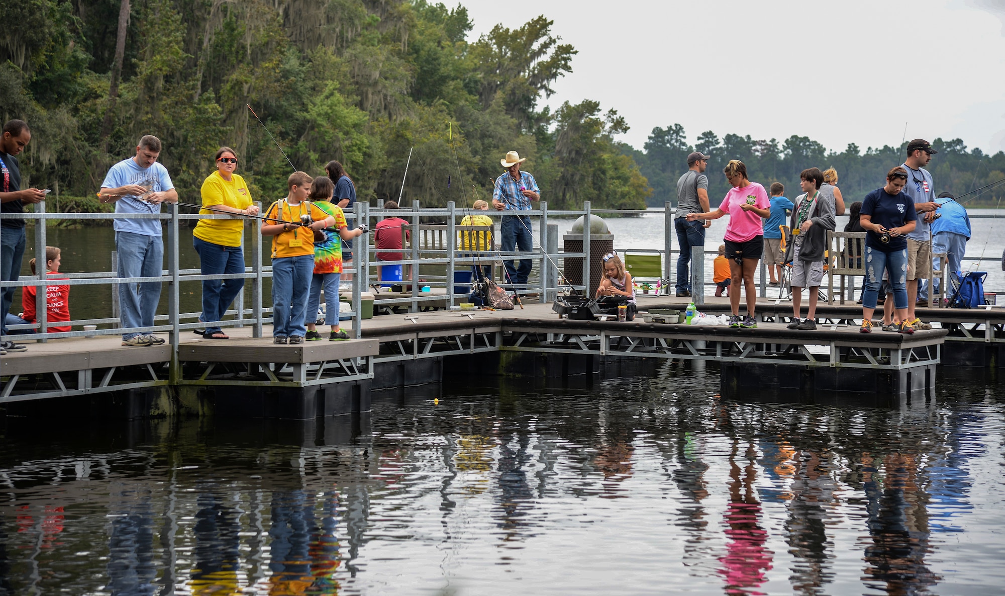 Military and community members participate in the Youth Fishing Rodeo Sept. 27, 2014, at Grassy Pond in Lake Park, Ga. This is the second year Moody hosted the event. (U.S. Air Force photo by Senior Airman Sandra Marrero/Released)
