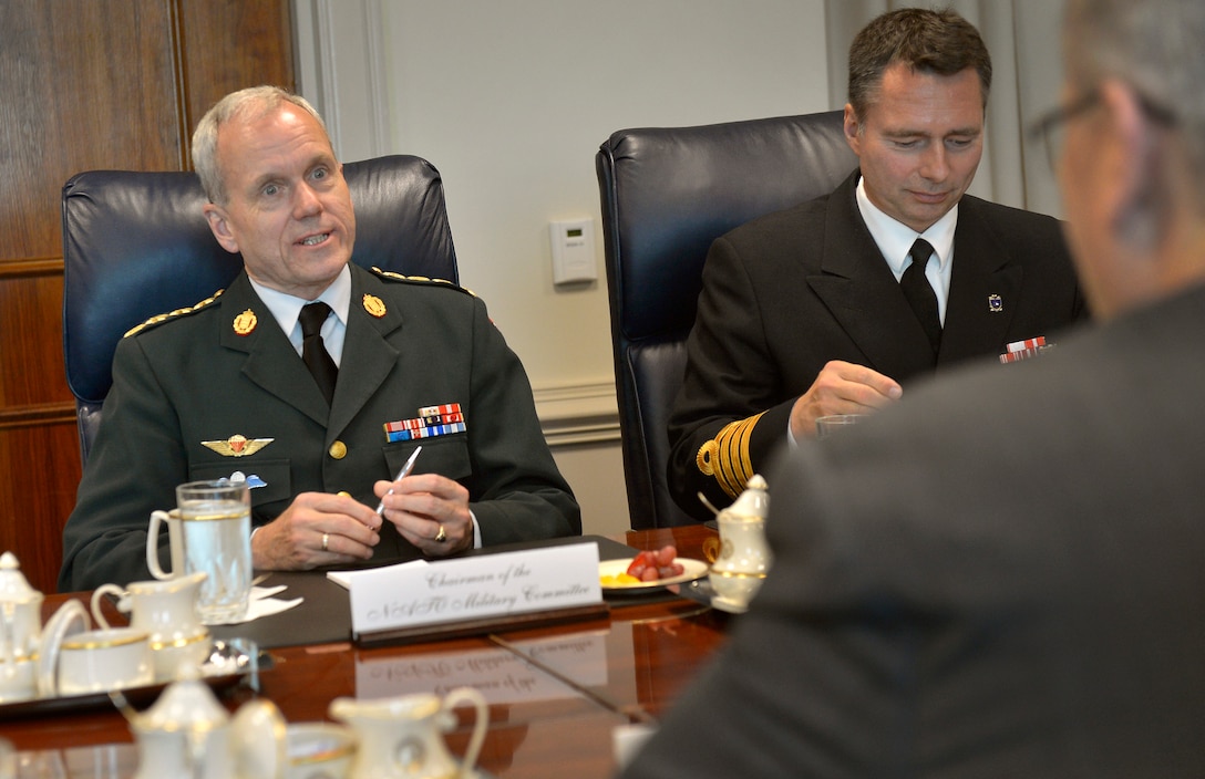 U.S. Deputy Defense Secretary Bob Work hosts a meeting with Danish Army Gen. Knud Bartels, left, chairman of NATO’s Military Committee, at the Pentagon, Oct. 2, 2014.