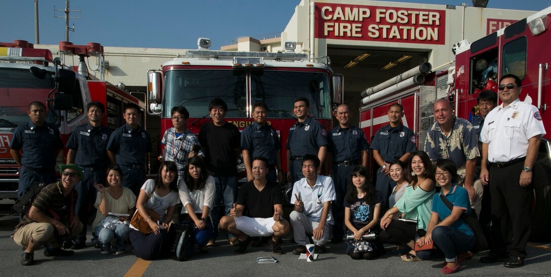 Students from Okinawa International University visit Camp Foster Fire Department Sept. 29 at the Camp Foster Fire Station. “It is good to know how the military and Japanese fire departments work together to (ensure) that they are ready for emergency situations,” said Akiki Miyagi, a Tomigusuku City, Okinawa, native and student at the Okinawa International University. Miyagi is majoring in English language and American culture. The visit focused on informing the students about natural disaster preparedness, along with educating them on the relationship between military and Okinawa fire departments.
