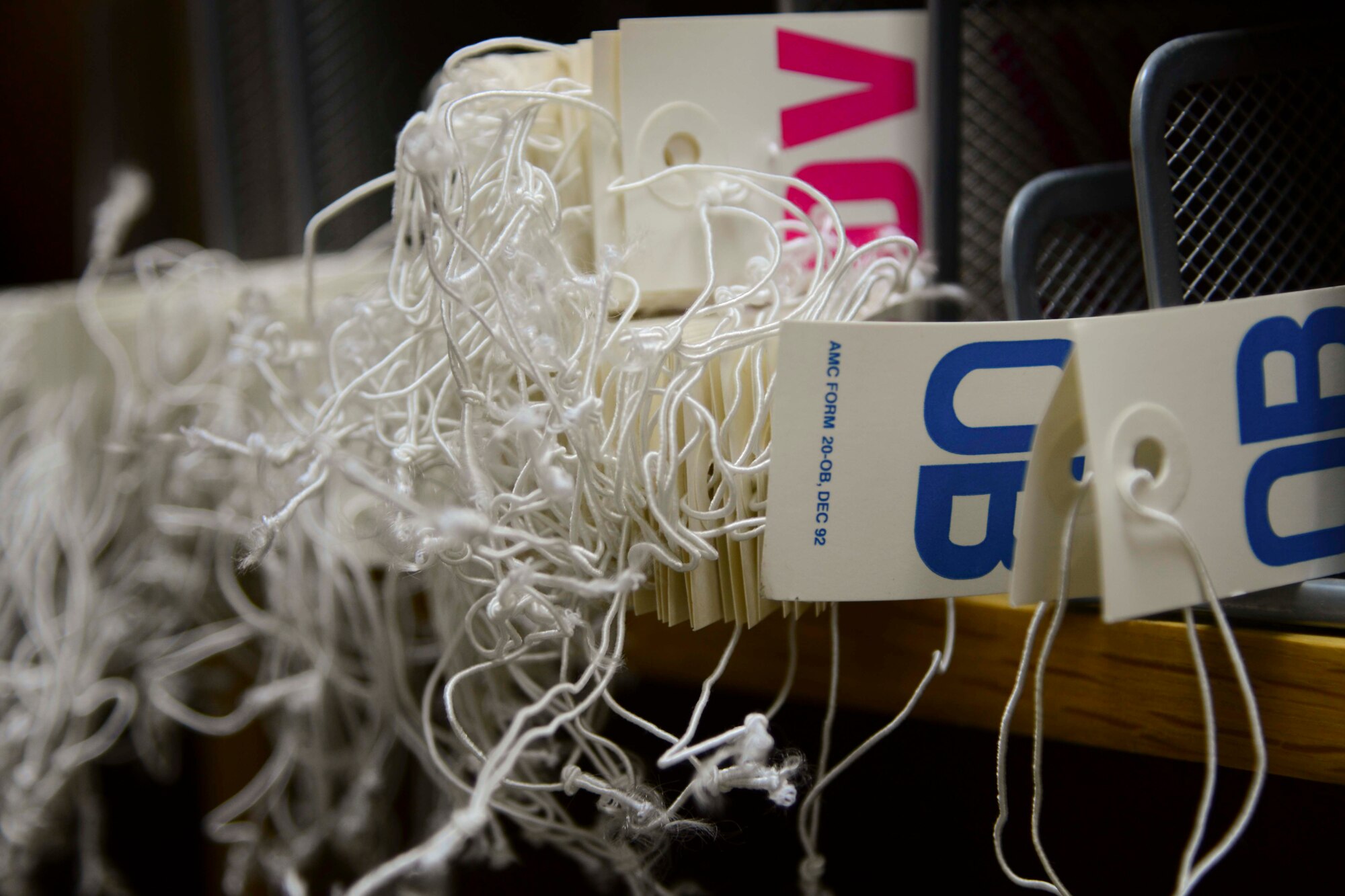 Baggage tags are available for service members in transit back to their home station at Al Udeid Air Base, Qatar, Oct. 1, 2014. The 8th Expeditionary Air Mobility Squadron’s passenger terminal averages more than 85,000 passengers with 3,200 tons of accompanying baggage and nearly 1,000 distinguished visitors annually. (U.S. Air Force photo by Staff Sgt. Ciara Wymbs)