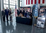 DIA’s recipients of the Hispanic Medal of Honor Society’s Legacy of Valor Medal pose in front of the exhibit with society president Rick Leal and Congressional Medal of Honor nominee Army Command Sgt. Maj. Ramon Rodriguez.
