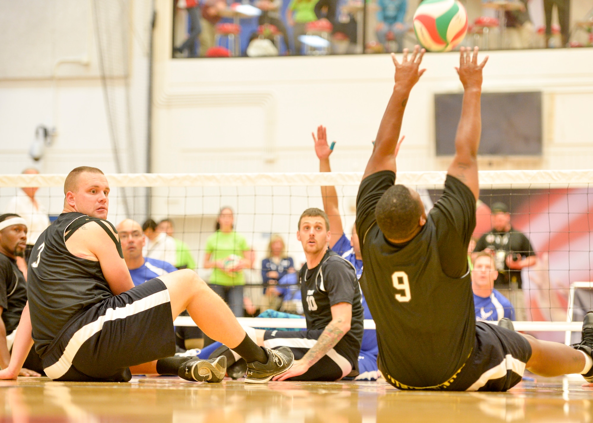 The Air Force and Army competed in the sitting volleyball bronze medal match at the 2014 Warrior Games Oct. 1, 2014, at the U.S. Olympic Training Center in Colorado Springs, Colo. The Army beat the Air Force in two sets, 25-20, 25-19. (U.S. Air Force photo/Staff Sgt. Devon Suits)