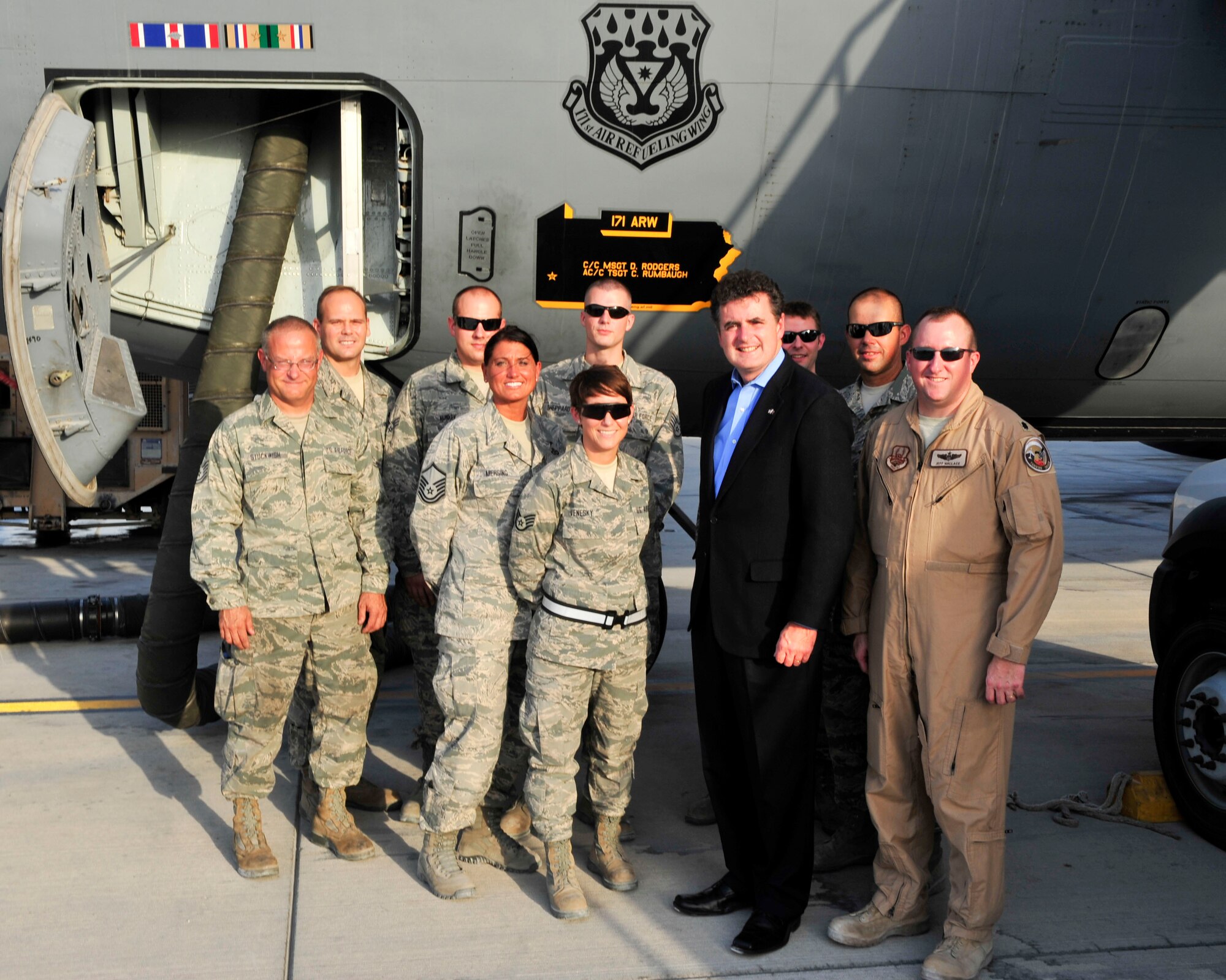 Congressman Michael Fitzpatrick from Pennsylvania’s 8th District, poses for a group photo with Airmen from Pennsylvania at Al Udeid Air Base, Qatar, Oct. 3, 2014. Fitzpatrick received a tour of the base and spoke with Airman from his home state of Pennsylvania about their experiences here. (U.S. Air Force photo by Senior Airman Colin Cates)  