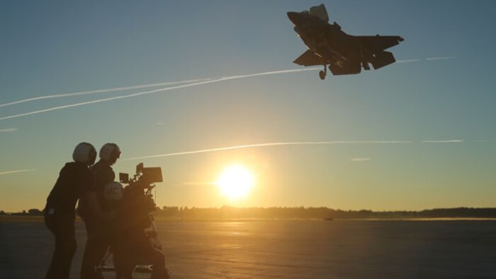 A film crew from Marine Corps Recruiting Command record an F-35B Lightning II Joint Strike Fighter landing aboard Marine Corps Air Station Beaufort, Oct. 1 to highlight the newest addition to the Marine Corps’ arsenal. The Pilot Training Center and Marine Fighter Attack Training Squadron 501 are slated to kick off the first F-35B pilot training course, also known as the F-35B Safe for Solo course, aboard Fightertown, Oct. 6.