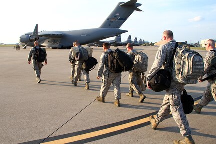 Airmen with the 123rd Contingency Response Group prepare for their deployment to West Africa from the Kentucky Air National Guard Base in Louisville, Ky., Oct. 2, 2014. The Guardsmen will work to set up a logistics hub in support of Operation United Assistance.