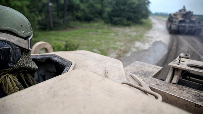A Marine with 2nd Maintenance Battalion, 2nd Marine Logistics Group, drives an M88A2 Hercules Recovery Vehicle during a vehicle recovery training operation aboard Marine Corps Base Camp Lejeune, N.C., Sept. 29, 2014.   Approximately 20 Marines conducted a training operation to recover an immobilized Hercules using a pulley and winch system.  Marines and sailors with the battalion conducted a field exercise Sept. 18 - Oct. 1, 2014, to reinforce their capability to accomplish battalion-level, mission essential tasks.