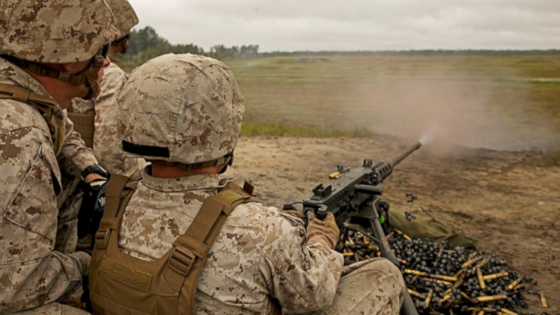 A Marine with 2nd Maintenance Battalion, 2nd Marine Logistics Group, fires an M2 .50-caliber machine gun at unknown distance targets during a live-fire training exercise on SR8 Multi-purpose Machine Gun Range aboard Marine Corps Base Camp Lejeune, N.C., Sept. 26, 2014.  Marines conducted annual machine-gun training to maintain proficiency and build confidence with the weapons systems. Marines and sailors with the battalion conducted a field exercise Sept. 18-Oct. 1, 2014, to reinforce their ability to accomplish battalion-level, mission essential tasks.