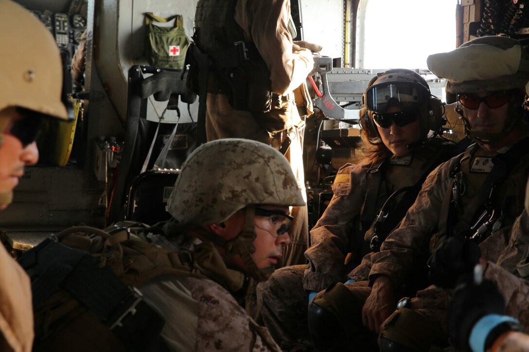 U.S. Navy hospital corpsmen with Combat Logistics Battalion 11, 11th Marine Expeditionary Unit (MEU), provide emergency medical care to a simulated casualty while in flight on a CH-53E Super Stallion from Marine Medium Tiltrotor Squadron 163 (Reinforced), 11th MEU, as part of an alert status drill, Oct. 1. Marines from the 11th MEU are deployed with the Makin Island Amphibious Ready Group as a flexible, adaptable and persistent force in the U.S. 5th Fleet area of responsibility. (U.S. Marine Corps photo by Cpl. Jonathan R. Waldman/ Released)