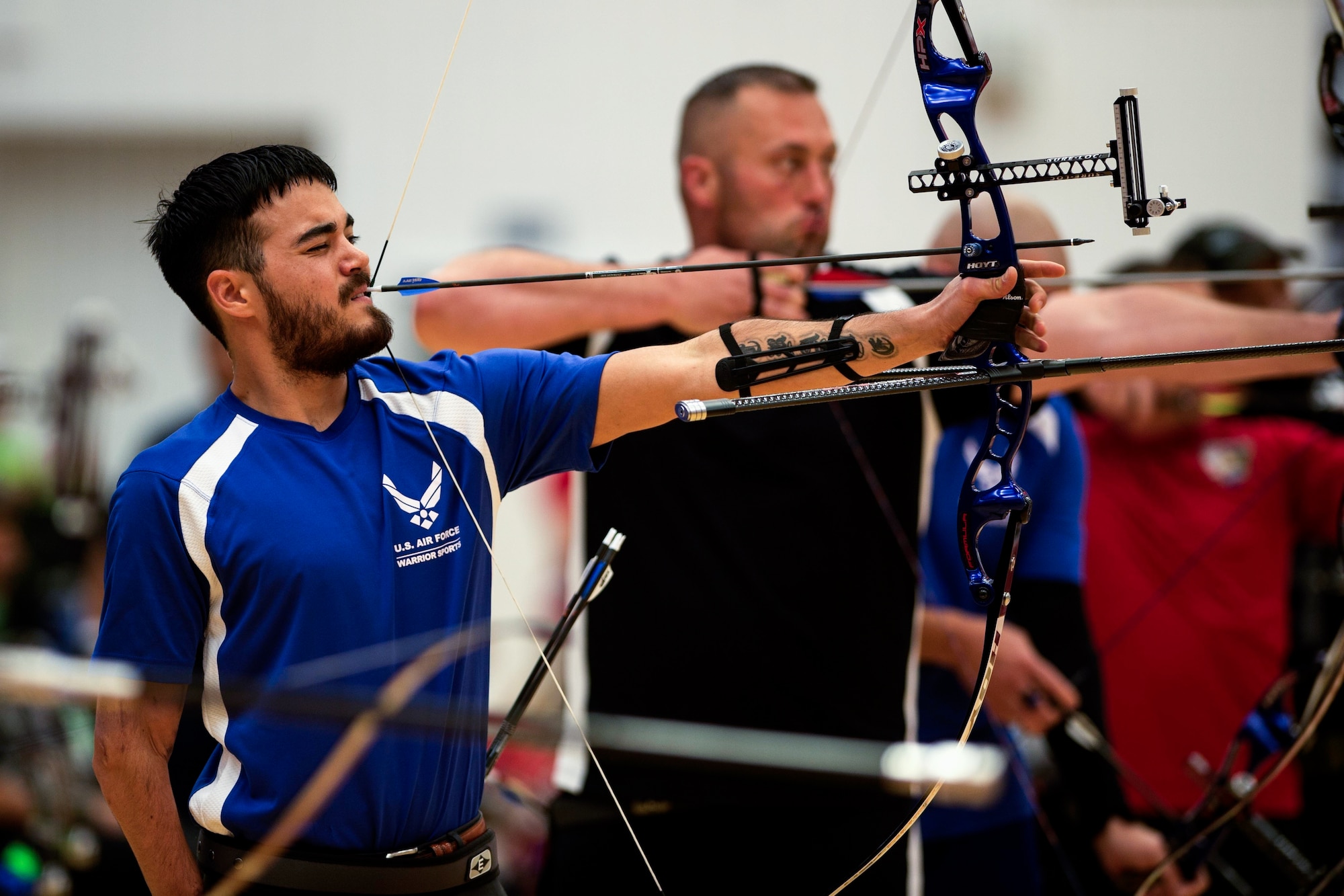 Air Force athlete Daniel Crain aims at his target in an archery qualification round during the 2014 Warrior Games Oct. 1, 2014, at the U.S. Olympic Training Center in Colorado Springs, Colo. The Warrior Games consist of athletes from the Defense Department, who compete in Paralympic-style events for their respective military branch. The goal of the games is to help highlight the potential of warriors through competitive sports. (U.S. Air Force photo/Airman 1st Class Scott Jackson)