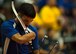 Air Force athlete Daniel Crane holds his bow to retrieve an arrow during the archery portion of the 2014 Warrior Games Oct. 1, 2014, Warrior Games at the U.S. Olympic Training Center, Colorado Springs, Colo. . The Warrior Games consist of athletes from the Defense Department, who compete in Paralympic-style events for their respective military branch. The goal of the games is to help highlight the limitless potential of warriors through competitive sports. (U.S. Air Force photo/Senior Airman Justyn M. Freeman)
