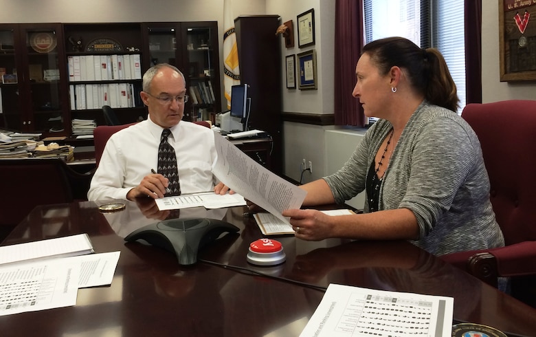 Andrea Murdock-McDaniel, right, the Southwestern Division chief of Operations and Regulatory, discusses a regional civil works project with SWD director of Programs Robert Slockbower.