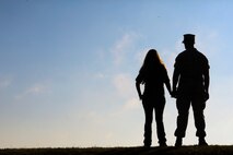 First Sergeant Eric Bauer, the Bravo Company first sergeant with 8th Engineering  Support Battalion, and Swansboro, N.C., native, and his wife, Shelly Bauer, survey their first event, the live-fire rifle range, during the 8th Engineering Support Battalion, 2nd Marine Logistics Group, Jane Wayne day, aboard Camp Lejeune, N.C. Sept. 30, 2014. Jane Wayne day is designed to show spouses a few of the jobs their Marines perform and to strengthen the bond between unit and family. (U.S. Marine Corps photo by Cpl. Michael Dye / Released)