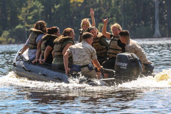 Marines with 8th Engineering Support Battalion, 2nd Marine Logistics Group teamed up with their spouses to participate in a Jane Wayne day aboard Camp Lejeune, N.C., Sept. 30, 2014. Jane Wayne day is designed to show spouses a few of the jobs their Marines perform and to strengthen the bond between unit and family. (U.S. Marine Corps photo by Cpl. Michael Dye / Released)