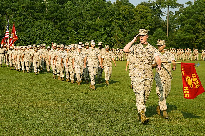 Members of the 2nd Transportation Support Battalion, Combat Logistics Regiment 2, 2nd Marine Logistics Group, march in review during the unit’s activation ceremony aboard Marine Corps Base Camp Lejeune, Oct. 2, 2014. The mission of the 2nd TSB is to provide transportation and support for the II Marine Expeditionary Force in order to facilitate the distribution of personnel, equipment and supplies by air, land and sea. (Marine Corps photo by Lance Cpl. Michelle M. Reif /Released)