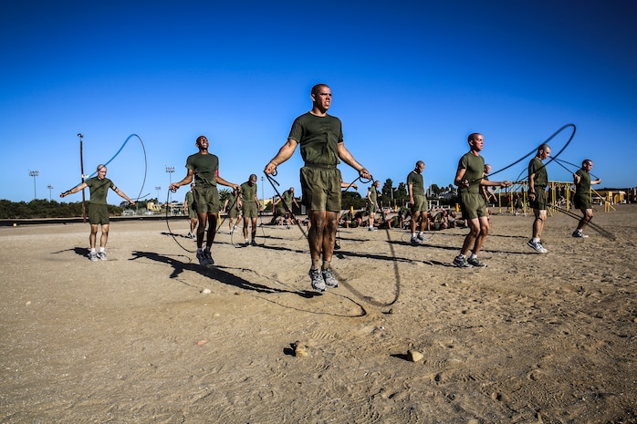 Recruits from Company A, 1st Recruit Training Battalion, jump rope during the circuit course event at Marine Corps Recruit Depot San Diego, Sept. 25. Before they began the course, the recruits performed the dynamic warm-up series to get their blood flowing.