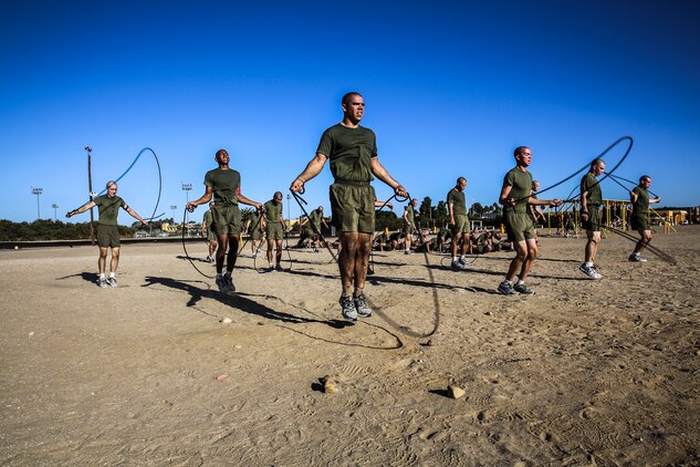 Recruits from Company A, 1st Recruit Training Battalion, jump rope during the circuit course event at Marine Corps Recruit Depot San Diego, Sept. 25. Before they began the course, the recruits performed the dynamic warm-up series to get their blood flowing.