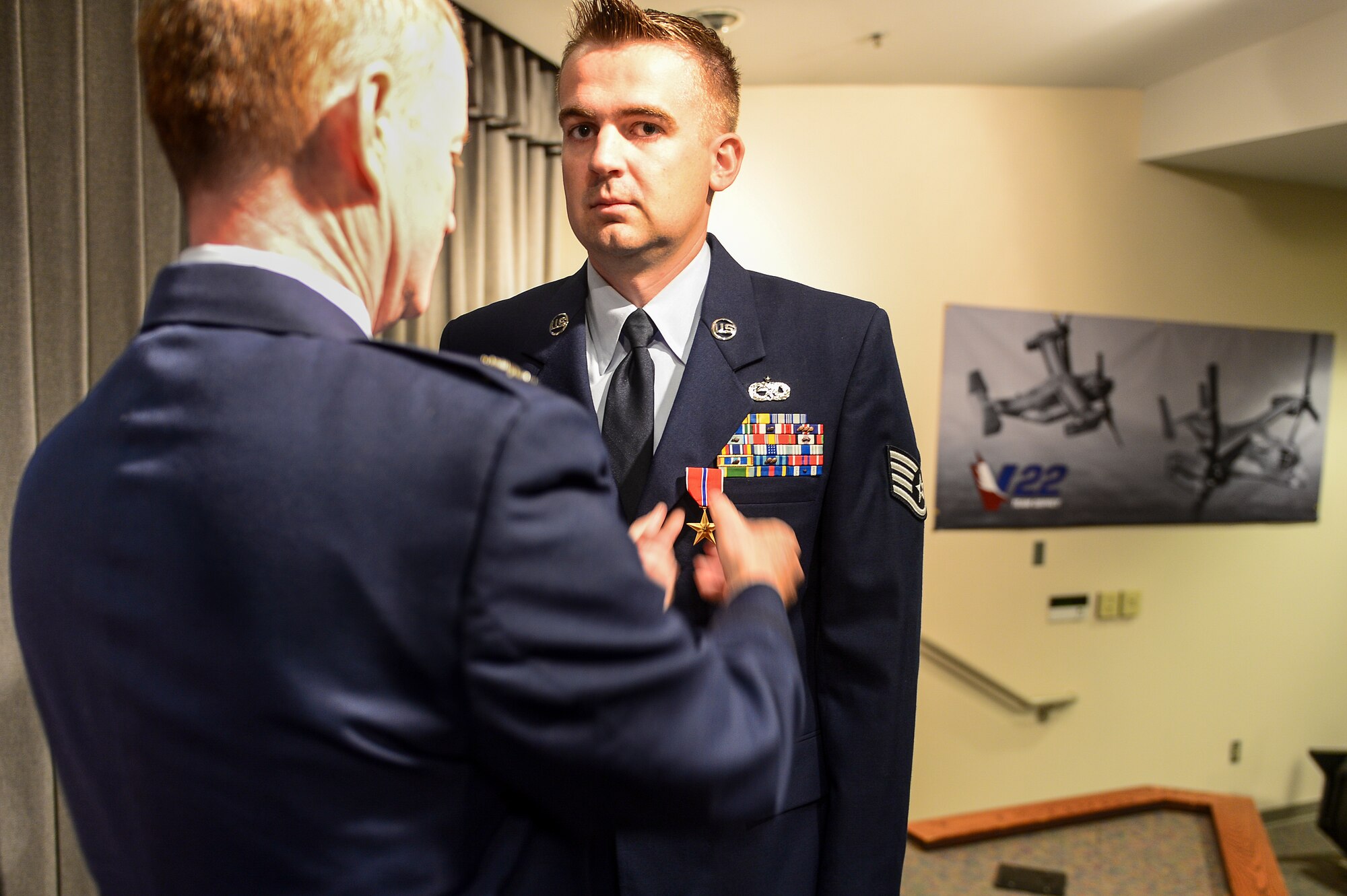 Staff Sgt. Reuben Bocock, 801st Special Operations Aircraft Maintenance Squadron tilt-rotor maintenance craftsman, received a Bronze Star medal at the 8th Special Operations Squadron auditorium on Hurlburt Field, Fla., Oct. 2, 2014. The award is presented for acts of heroism and single acts of merit during ground combat operations. (U.S. Air Force photo/Airman 1st Class Jeff Parkinson) 