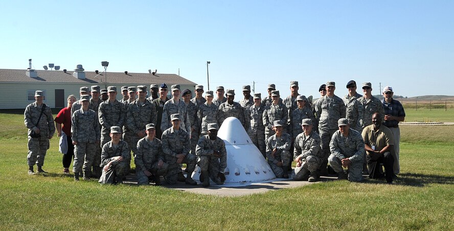 Airmen from the 319th Air Base Wing at Grand Forks Air Force Base, N.D., toured the Oscar-Zero Missile Alert Facility in Cooperstown, N.D., Sept. 26, 2014. The tour was led by other Warriors of the North who had personal experience working with missile silos and the MAF itself many years ago. (U.S. Air Force photo/Airman 1st Class Bonnie Grantham)