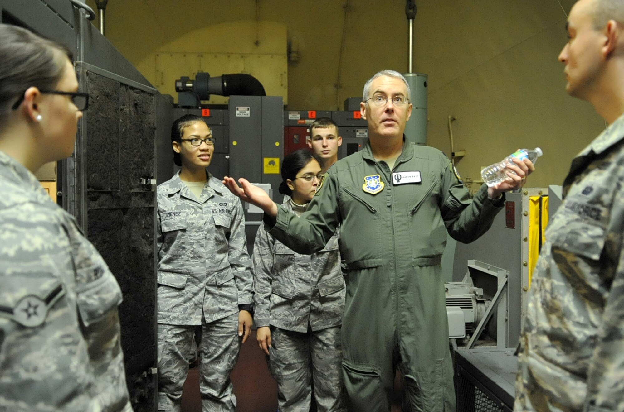 Lt. Col. Aaron Bass, 319th Air Base Wing inspector general, leads Airmen from Grand Forks Air Force Base, N.D., through the halls of history inside the Oscar-Zero Missile Alert Facility Launch Control Center in Cooperstown, N.D., Sept. 26, 2014. Bass started his Air Force career as a missileer at the Oscar-Zero MAF more than 20 years ago. (U.S. Air Force photo/Airman 1st Class Grantham)