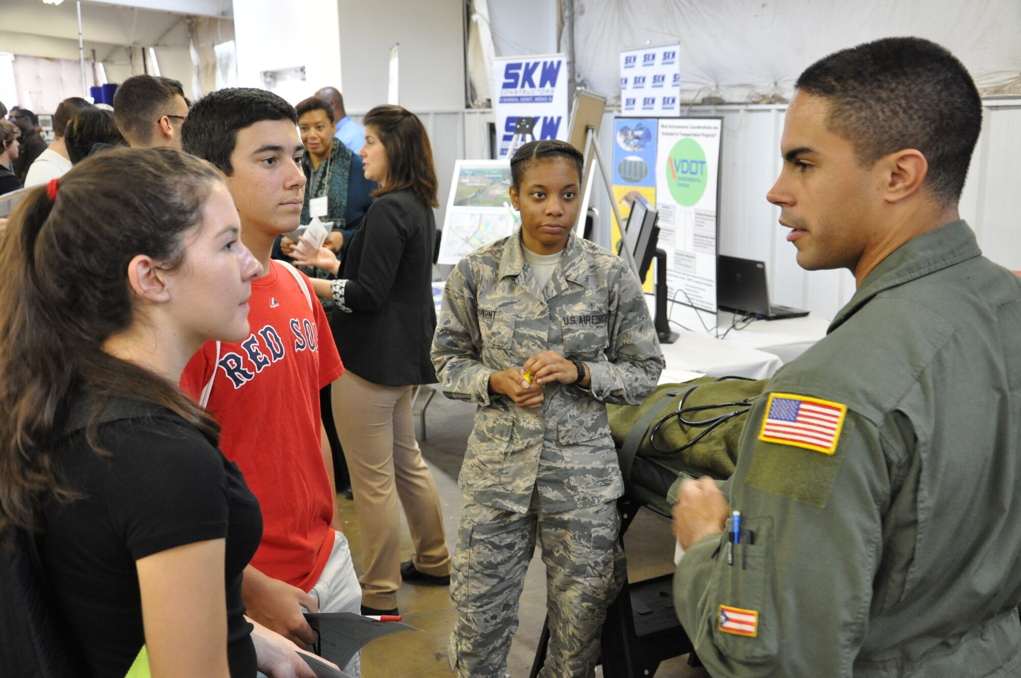 Members of the 459th Air Refueling Wing talk to students from Prince William County area high schools at the 10th Annual Virginia Department of Transportation Career Fair held at the Prince William County Fairgrounds in Manassas, Virginia, on October 2, 2014. The wing and other agencies and businesses volunteer for the event to show students the various opportunities in the world of transportation. Hundreds of students attend this event each year. (U.S. Air Force photo / Maj. Tim Smith)