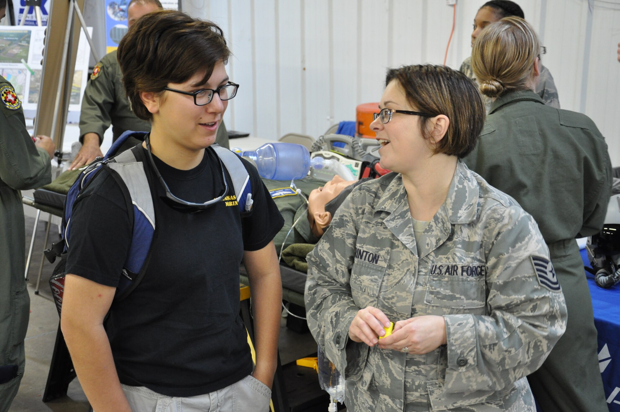 Members of the 459th Air Refueling Wing talk to students from Prince William County area high schools at the 10th Annual Virginia Department of Transportation Career Fair held at the Prince William County Fairgrounds in Manassas, Virginia, on October 2, 2014. The wing and other agencies and businesses volunteer for the event to show students the various opportunities in the world of transportation. Hundreds of students attend this event each year. (U.S. Air Force photo / Maj. Tim Smith)