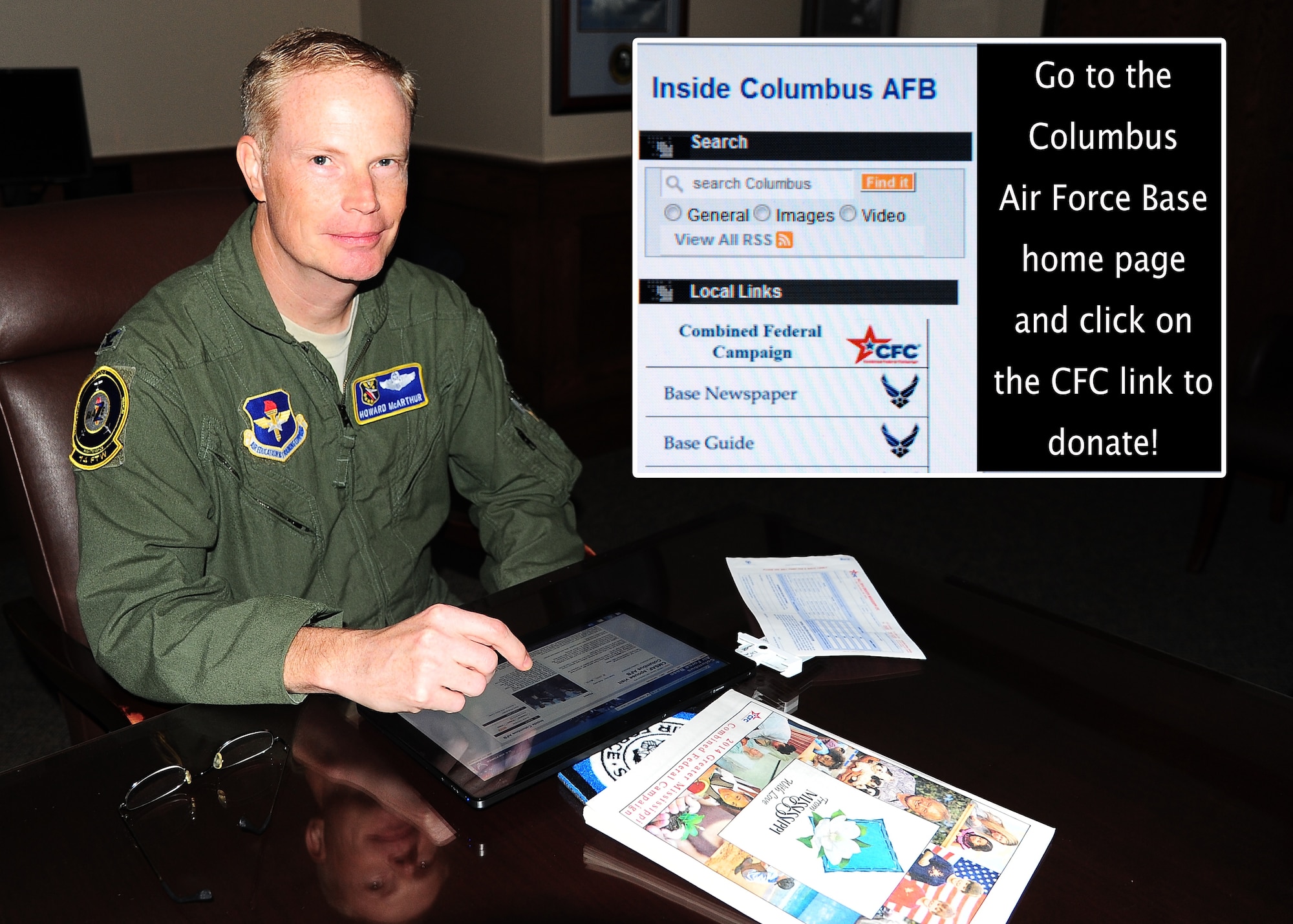 Col. Howard McArthur, 14th Flying Training Wing Vice Commander, visits the Columbus Air Force Base website Sept. 29 in the 14th FTW conference room to make his Combined Federal Campaign donation online. As shown in the inset photo, Airmen can click on the CFC link provided on the base website to donate electronically. The 14th FTW CFC campaign runs Oct. 1-31. (U.S. Air Force photo illustration/Melissa Doublin)