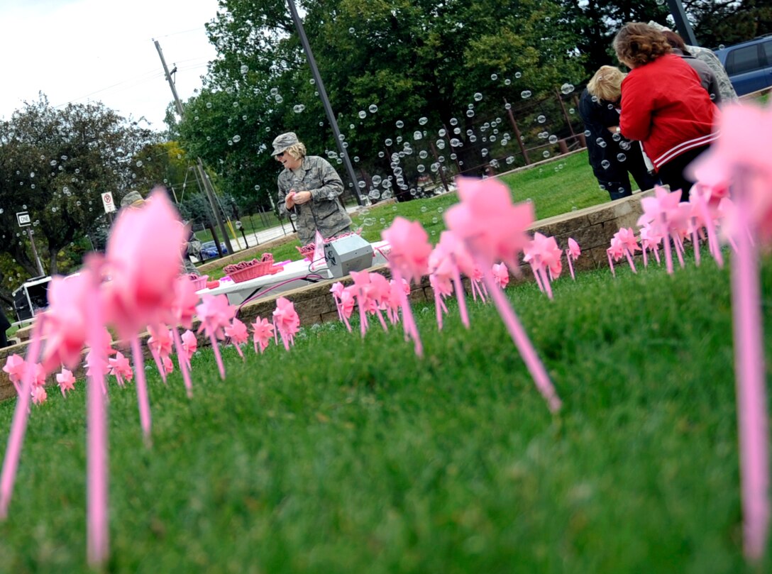 Pink pinwheel cover the front lawn of the Ehrling Bergquist clinic Oct. 3 during the Blow Away Breast Cancer event. The event celebrated Breast Cancer Awareness Month and was in honor of our military family members who are fighting with breast cancer, our survivors and those who lost their fight. (U.S. Air Force photo by Jeff W. Gates)