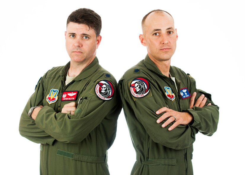 Lieutenant Col. Steven Beattie, 29th Attack Squadron commander and Lt. Col. Juan Torres, 9th ATKS commander pose together at Holloman Air Force Base, N.M., Sept. 30. In an attempt to ensure consistency among their students, the 9th and 29th Attack Squadron’s collaborated through a series of friendly challenges, ultimately culminating in an armistice to signify the unity of their mission. (U.S. Air Force photo by Senior Airman Daniel E. F. Liddicoet/Released)