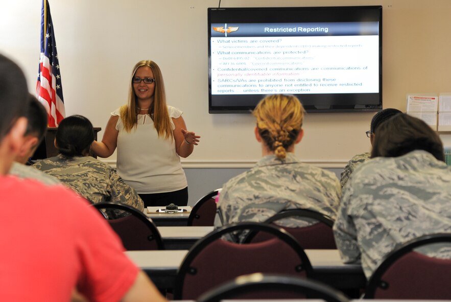 Harmony Miscisin, Sexual Assault Response Coordinator intern, briefs Barksdale victim advocates on required ethics training on Barksdale Air Force Base, Sept. 30, 2014.  Victim advocates are active-duty military members selected by the installation's Sexual Assault Response Coordinator to provide essential support, liaison services and care to victims. (U.S. Air Force photo/Senior Airman Jannelle Dickey)