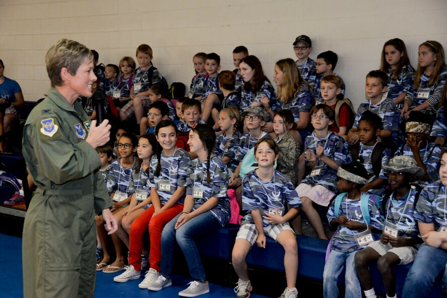 Col. Kristin Goodwin, 2nd Bomb Wing commander, welcomes Operation Hero participants on Barksdale Air Force Base, La., Sept. 27, 2014. Operation Hero is a mock deployment intended to give children a better understanding of the deployment process their parents go through. (U.S. Air Force photo/Airman 1st Class Mozer O. Da Cunha)