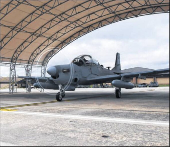 An A-29 Super Tucano taxis on the flightline Sept. 26 at Moody Air Force base, Ga. The Afghan A-29 Light Air Support training mission will begin at Moody in February 2015, and the A-29 will provide offensive and defensive aerial fires capability and reconnaissance and surveillance capability within Afghanistan. (Air Force photo by Airman 1st Class Dillian Bamman)