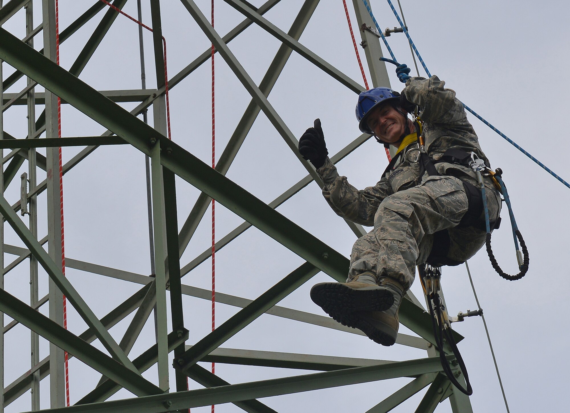 Lt. Gen. Darryl Roberson, 3rd Air Force and 17th Expeditionary Air Force commander, participates in a simulated rescue mission at a 1st Communications Maintenance Squadron communication tower during an immersion tour on Ramstein Air Base, Germany, Sept. 30, 2014. Roberson met multiple Airmen while learning about their day-to-day tasks during his tour of several units within the wing. The tour helped give him a better understanding of the wing’s operations and how it contributes to the overall Air Force mission. (U.S. Air Force photo/Senior Airman Holly Mansfield)