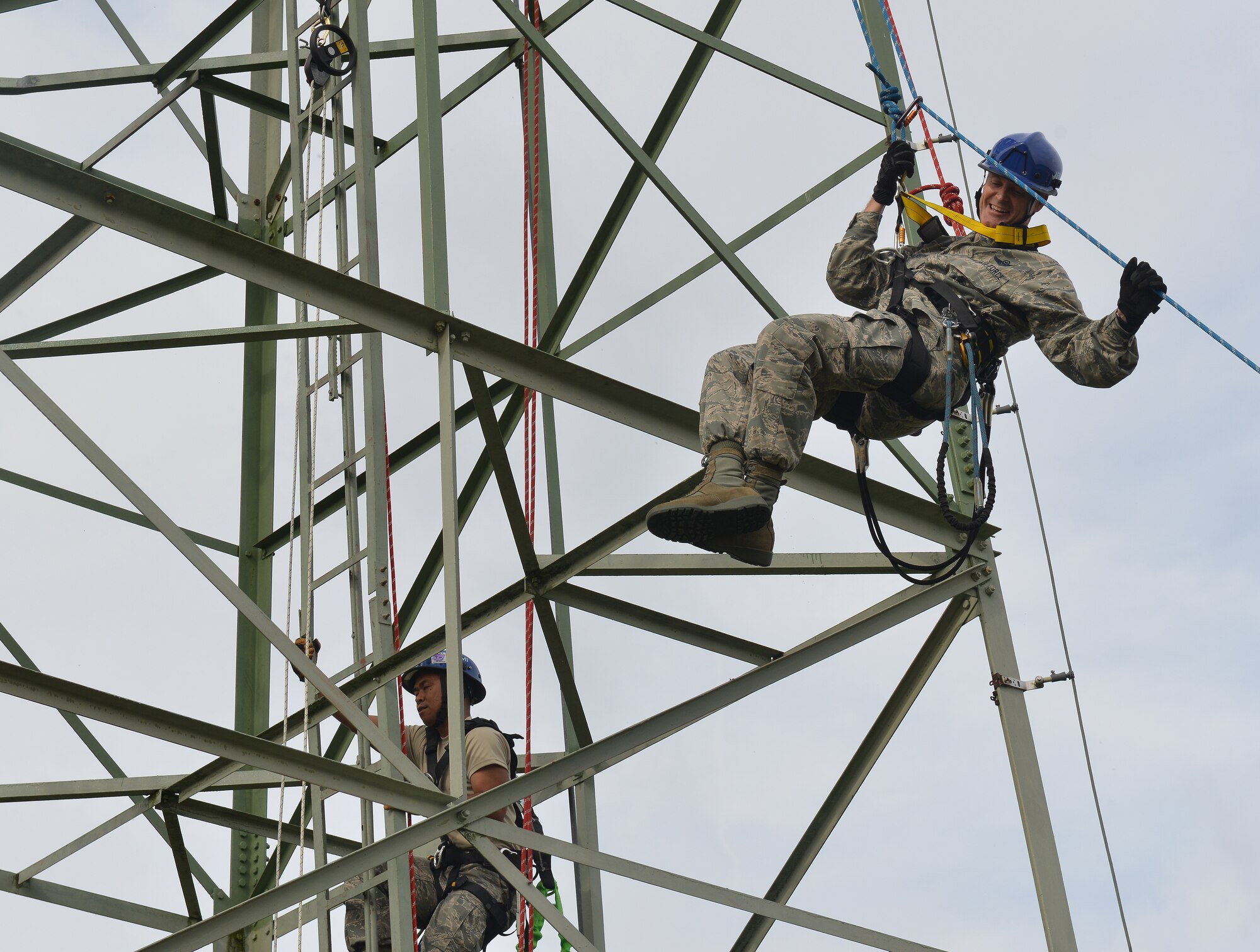 Lt. Gen. Darryl Roberson, 3rd Air Force and 17th Expeditionary Air Force commander, participates in a simulated rescue mission at a 1st Communications Maintenance Squadron communication tower during an immersion tour on Ramstein Air Base, Germany, Sept. 30, 2014. Roberson met multiple Airmen while learning about their day-to-day tasks during his tour of several  units within the wing. The tour helped give him a better understanding of the wing’s operations and how it contributes to the overall Air Force mission. (U.S. Air Force photo/Senior Airman Holly Mansfield)
