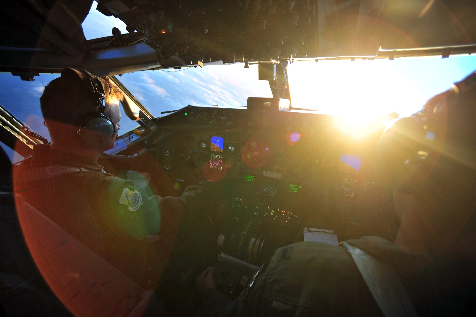 U.S. Air Force Capt. Mark Watson, left, 100th Operations Group pilot from Rockwall, Texas and U.S. Air Force 1st Lt. Matthew Kellogg, 351st Air Refueling Squadron pilot from Okinawa, Japan,  fly over England prior to participating in exercise Tonnerre Lightning Oct. 2, 2014. Exercise Tonnerre Lightning is a NATO exercise designed to improve interoperability between partner nation air forces. (U.S. Air Force Photo/Senior Airman Christine Griffiths/Released)