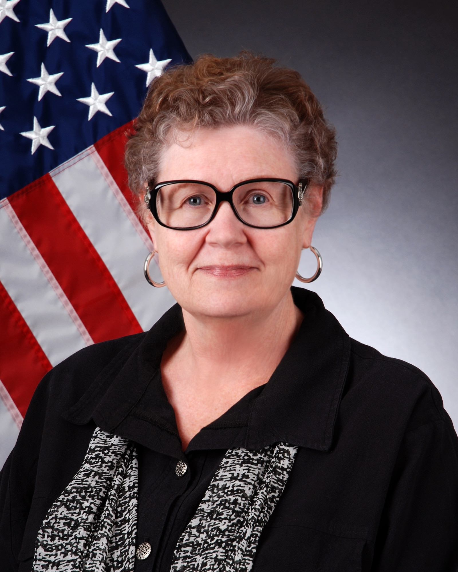 Phyllis Jeter, director of Mental Health for the 94 Airlift Wing, poses for an official photo Sept. 30, 2014, at Dobbins Air Reserve Base, Ga. Jeter is a native of south Georgia. (U.S. Air Force photo by Brad Fallin/Released)