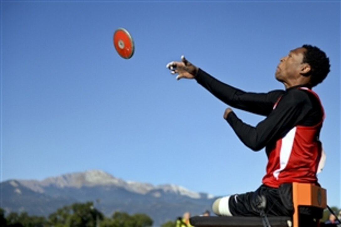 The Marine Corps team's Sgt. Anthony McDaniel Jr. throws the discus during the 2014 Warrior Games in Colorado Springs, Colo., Oct. 2, 2014. More than 200 wounded, ill and injured service members, and veterans are competing in the Warrior Games at the U.S. Olympic Training Center.