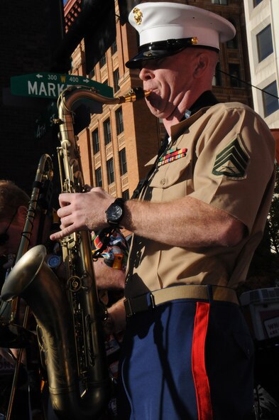 Staff Sgt. Jebediah Koch from the recruiting station Harrisburg with the 1st Marine Corps, plays the saxophone during the Fox 29 Salutes the Military Day Sept. 26, 2014, Philadelphia, Pa. The event showcased each military branch, including active-duty, Reserve and National Guard components. (U.S. Air National Guard photo by Tech. Sgt. Andria J. Allmond/Released)