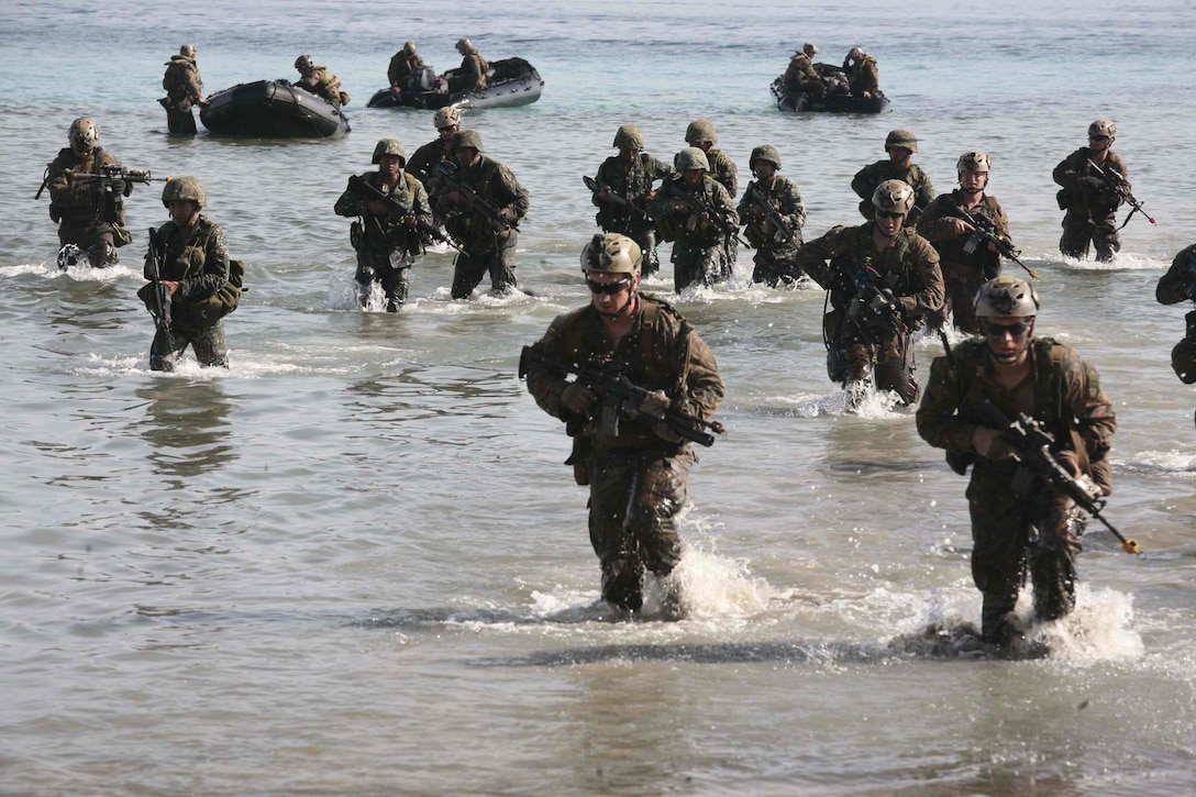 Philippine and U.S. Marines simulate a beach landing from combat rubber raiding crafts onto a small island off the coast of Palawan, Philippines, Oct. 2 during Amphibious Landing Exercise 2015. The amphibious assault and boat raids were conducted by U.S. Marines to complete a certification exercise being held in conjunction with PHIBLEX 15. PHIBLEX is an annual, bilateral training exercise conducted by the Armed Forces of the Philippines, U.S. Marines and Navy to strengthen interoperability across a range of capabilities, including disaster relief and contingency operations. The AFP Marines are with 12th Marine Battalion, Philippine Marine Corps, and the U.S. Marines are with Battalion Landing Team 3rd Battalion, 5th Marine Regiment, 31st Marine Expeditionary Unit. 