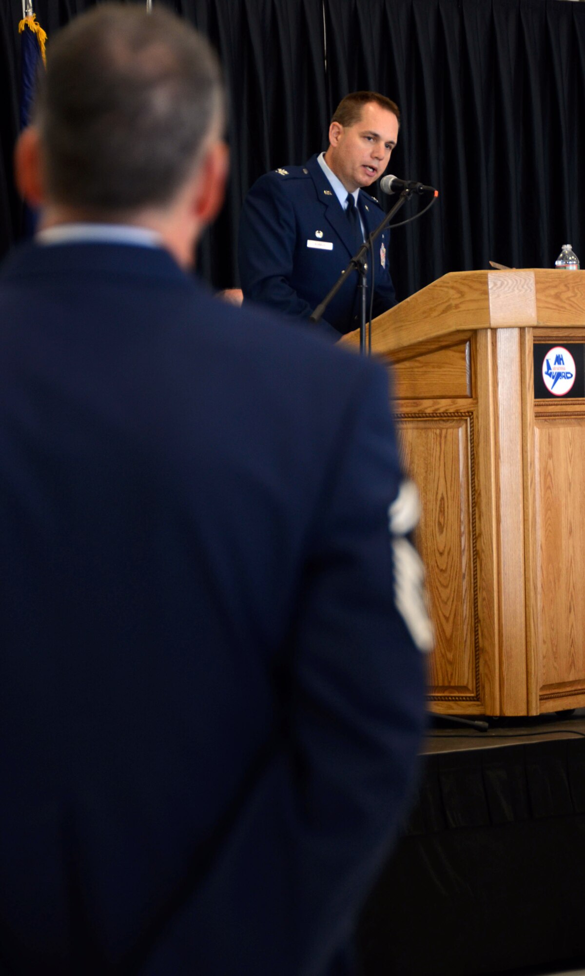 U.S. Air Force Col. Shawn "Rob" Burrus, commander of the 157th Air Refueling Wing, addresses the airmen after assuming command during a change of command ceremony, Pease Air National Guard Base, N.H., Oct. 5, 2014. This ceremony signified command of the wing changing from Col. Paul Hutchinson to Burrus. (Air National Guard photo by Airman 1st Class Kayla McWalter/RELEASED)