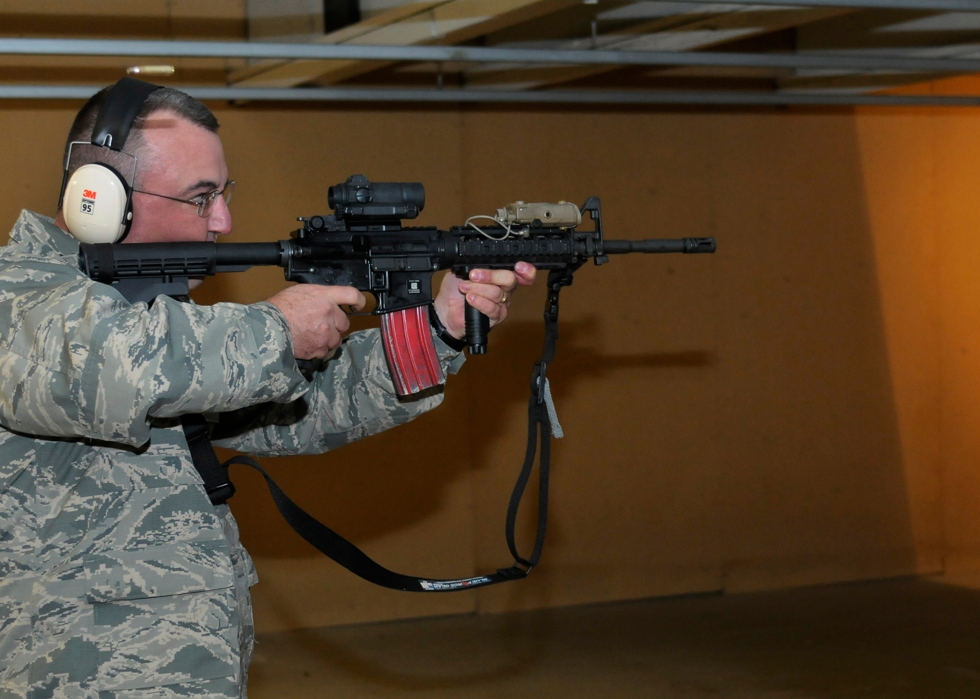 Brass flies as Col. Patrick Webb, 419th Maintenance Group commander, fires at multiple targets during a friendly competition with other commanders. (U.S. Air force photo/Capt. Amber Balken)