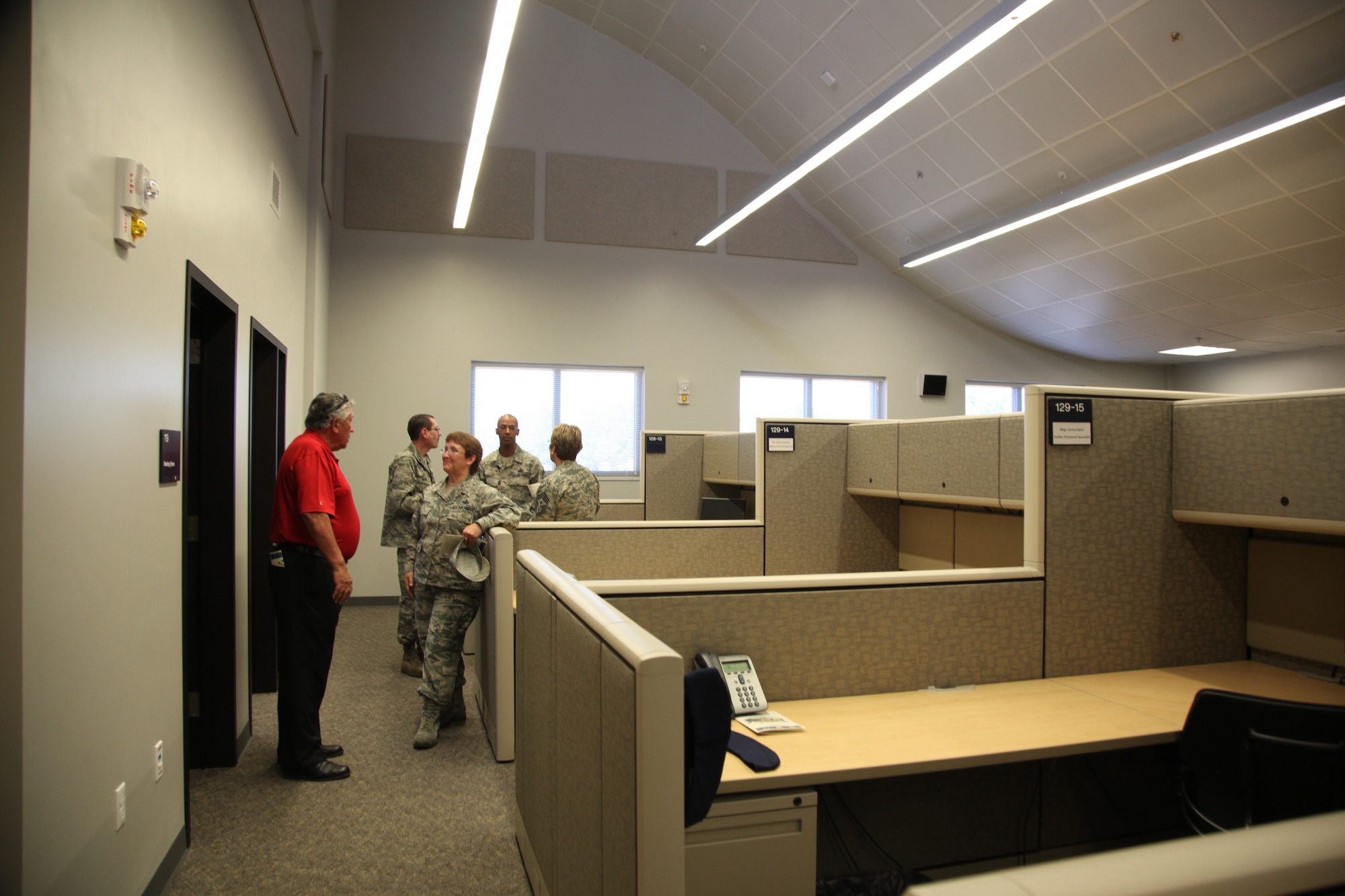 Visitors gather in the new headquarters building for the 162nd Combat Communications Group, Sept. 4, 2014 at Beale Air Force Base, Calif.  The open house followed a ribbon-cutting ceremony welcoming the California Air National Guard unit to Beale. (U.S. Air Force photo by Tech. Sgt. Kenneth McCann/Released) 