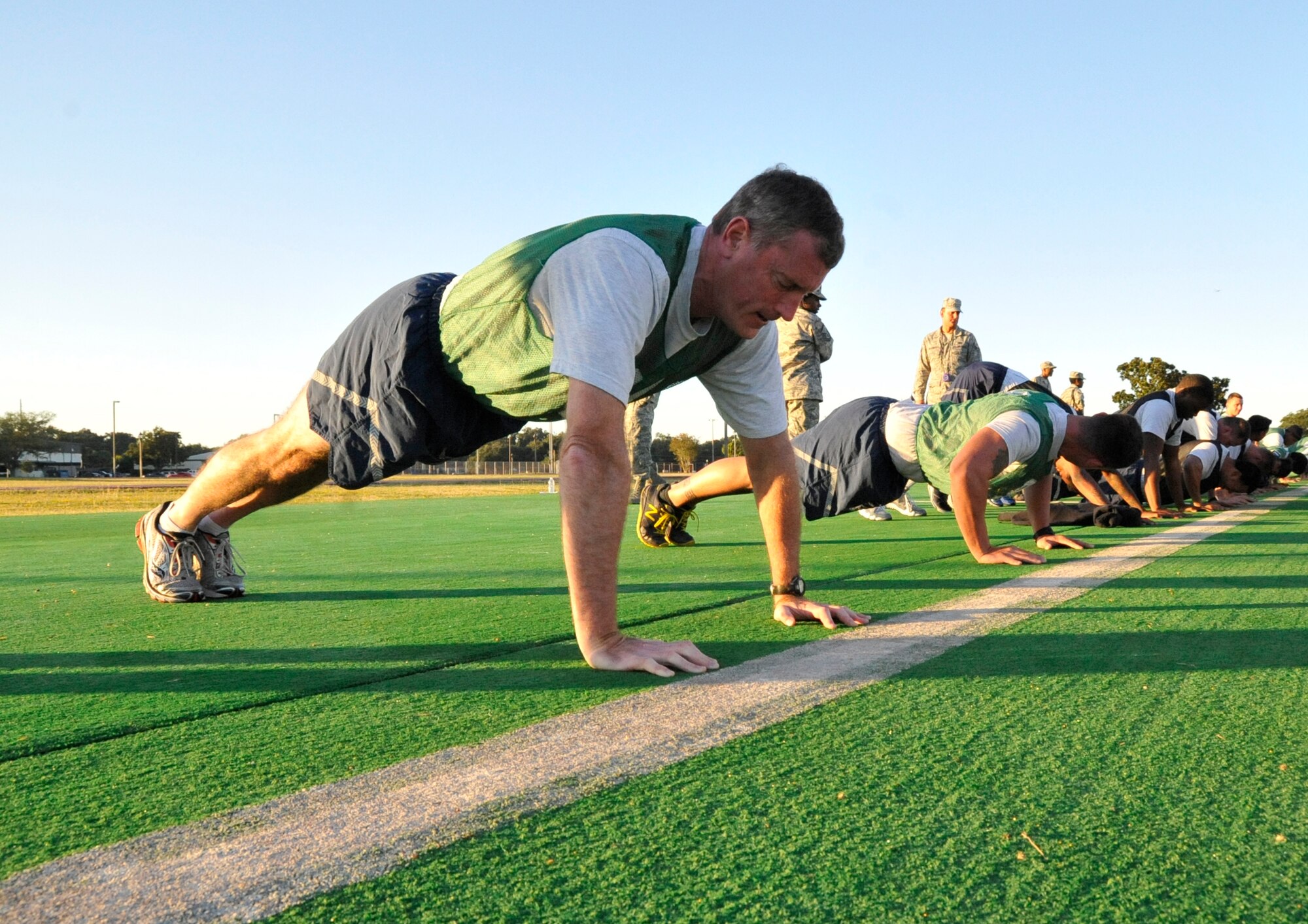 Lt. Col. John Gallagher, 53rd Weather Reconnaissance Squadron weather officer, performs push-ups during the physical fitness test here October 5.   (U.S. Air Force photo/Master Sgt. Jessica L. Kendziorek)