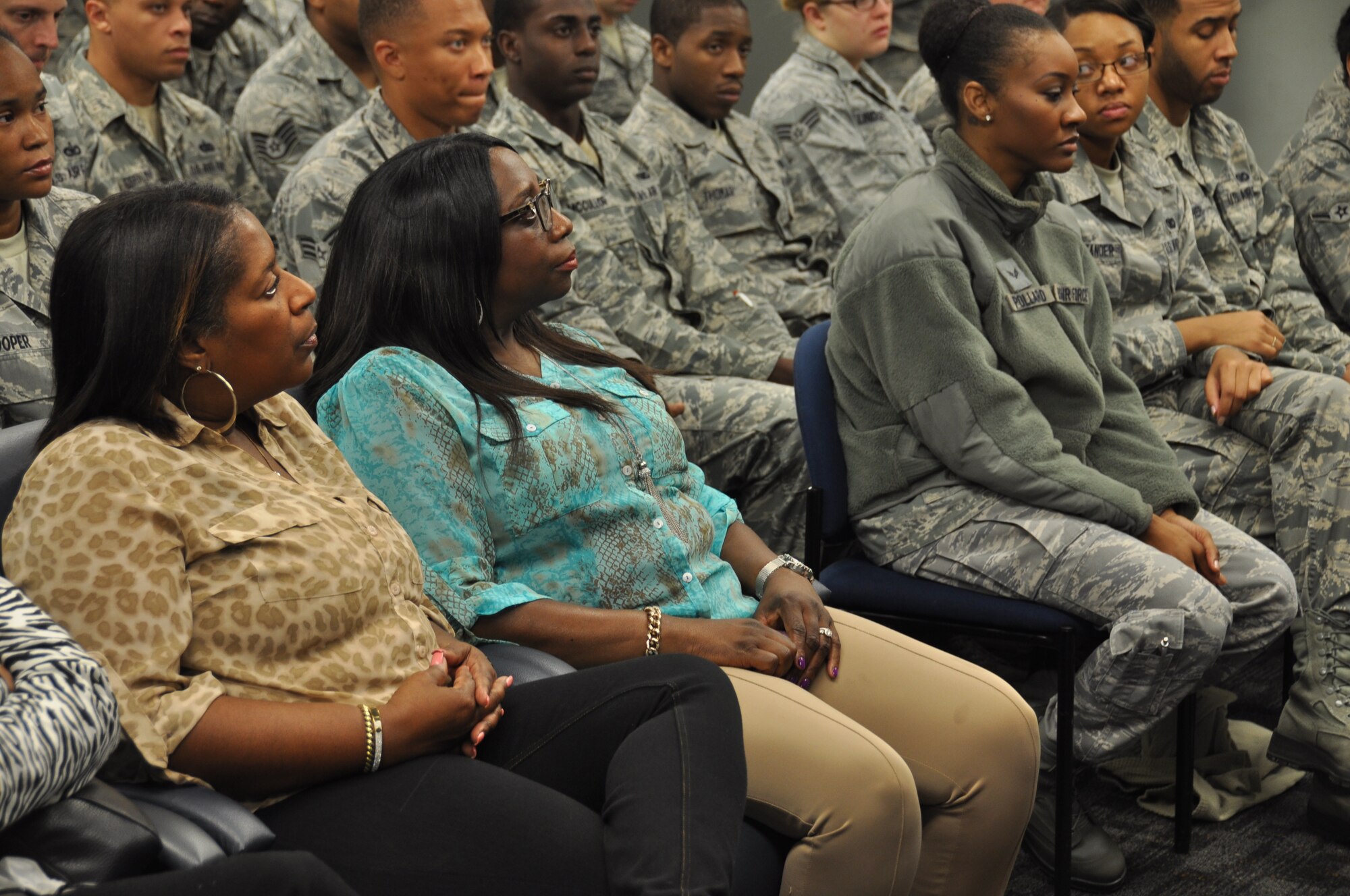 Angela Hardeman, mother of the late 94th Security Forces Squadron member Jessica Hardeman, attends her daughter's memorial service at the SFS building on Dobbins AIr Reserve Base, Ga., Oct. 4, 2014. The 94th SFS held the service in honor of Jessica's memory, and held an awareness walk for victims of domestic violence. (U.S. Air Force Photo by Senior Airman Miles Wilson)