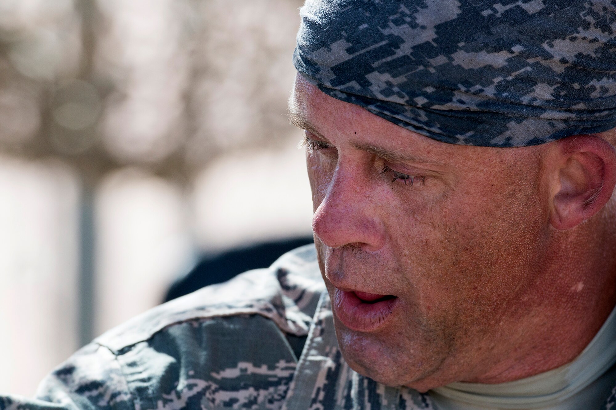 U.S. Air Force Staff Sgt. Randy Patrick, 307th Security Forces Squadron, catches his breath after completing the Global Strike Challenge Mental and Physical competition, Sept. 25, 2014, Camp Guernsey, Wyo. The Global Strike Challenge is the world's premier bomber, Intercontinental Ballistic Missile, helicopter operations and security forces competition with units from Air Force Global Strike Command, Air Combat Command, Air Force Reserve Command and the Air National Guard. (U.S. Air Force photo by Master Sgt. Greg Steele/Released)