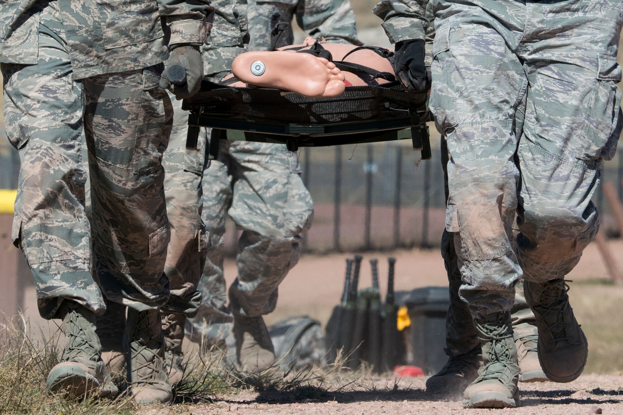 Members of the 307th Security Forces Squadron are tested on their Self-Aid and Buddy Care skills during the Global Strike Challenge Mental and Physical competition, Sept. 25, 2014, Camp Guernsey, Wyo. The Global Strike Challenge is the world's premier bomber, Intercontinental Ballistic Missile, helicopter operations and security forces competition with units from Air Force Global Strike Command, Air Combat Command, Air Force Reserve Command and the Air National Guard. (U.S. Air Force photo by Master Sgt. Greg Steele/Released)